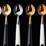 fotografia sobre cucharas medidoras el accesorio imprescindible para tu cafe expresso para portada de una categoria en una pagina web sobre cafe y cafe expresso y utiliza mucho el color oro b89634 1