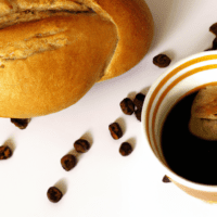 fotografia sobre cafe expresso y pan una combinacion clasica para portada de una categoria en una pagina web sobre cafe y cafe expresso y utiliza mucho el color oro b89634 y en menor medida el col